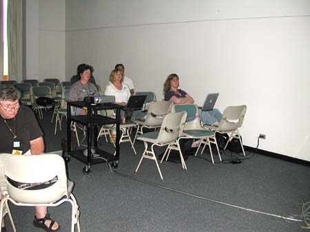 Sharon Thorp, Peggy Kenyon, Cheryl Johnson and others take in a session