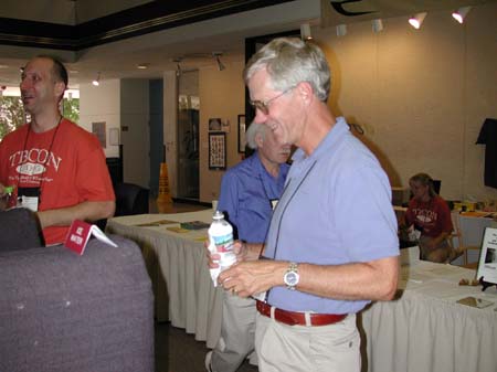 Chris Bell, Gene Hall (obscured) and Paul Knap during a break